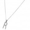 Dije letra "R" en oro blanco de 14k 0.13 ct